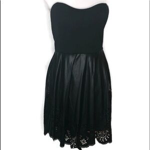 Dots strapless dress in black. Size L. Has lining